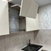 Кухонный гарнитур с глянцевыми фасадами на заказ